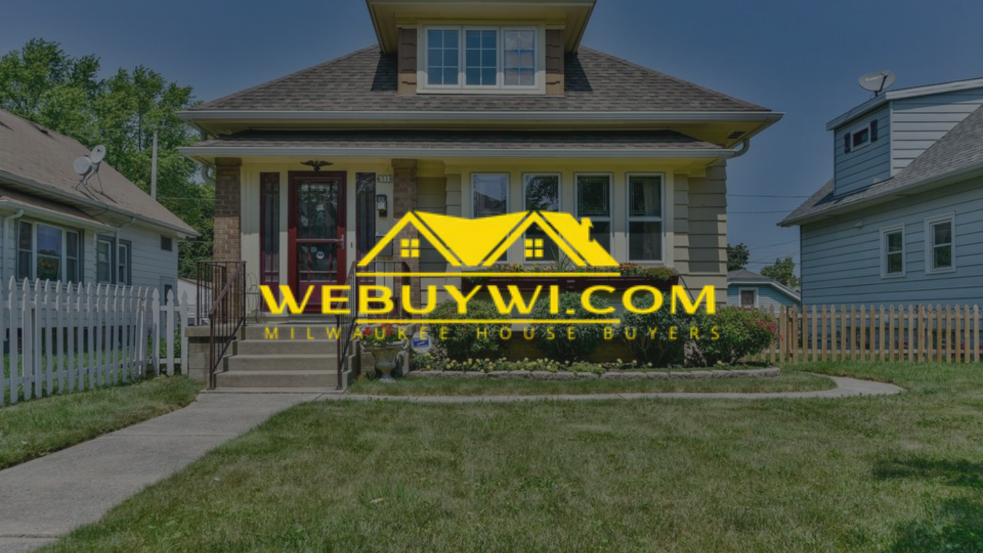 A yellow house with a WeBuyWI.com logo on it, in front of green grass and a sidewalk.