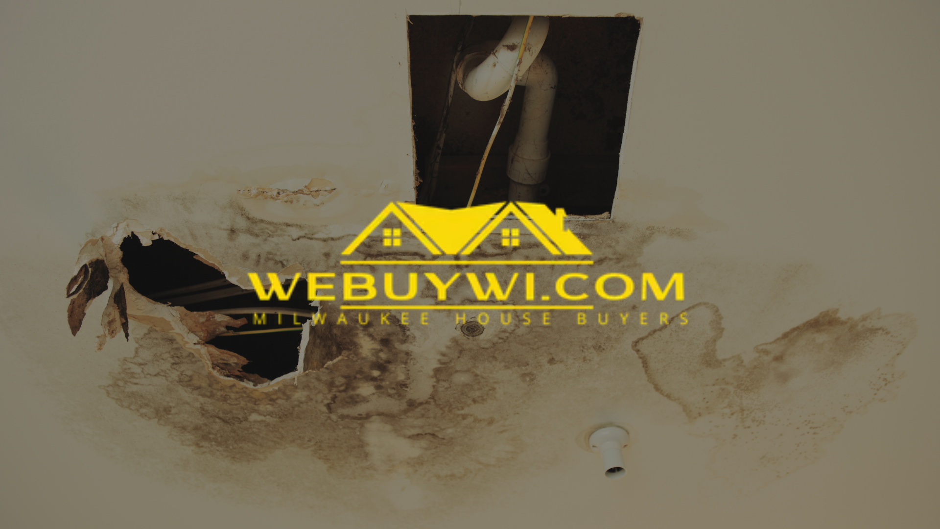 Hole in ceiling with water damage and exposed pipes; brown stains and logo for a house-buying service.