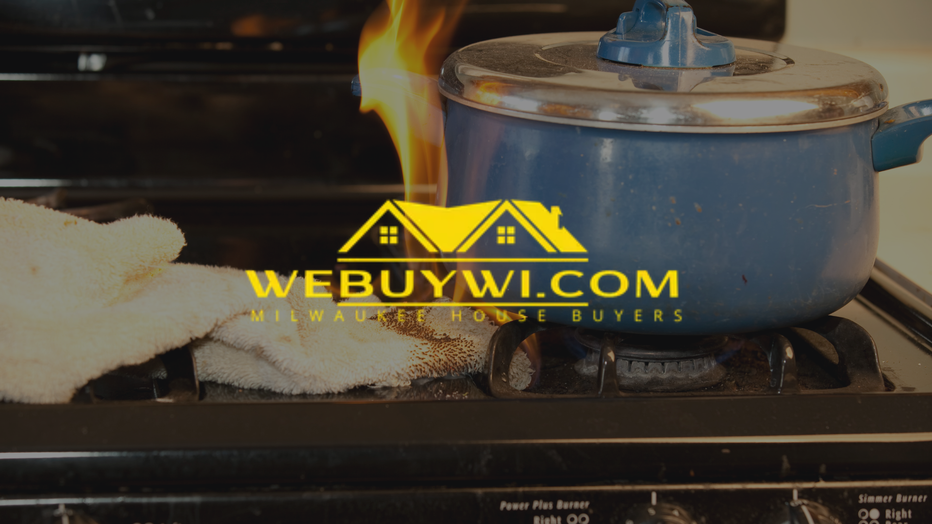 A pot on fire on a stovetop, with a rag and the logo
