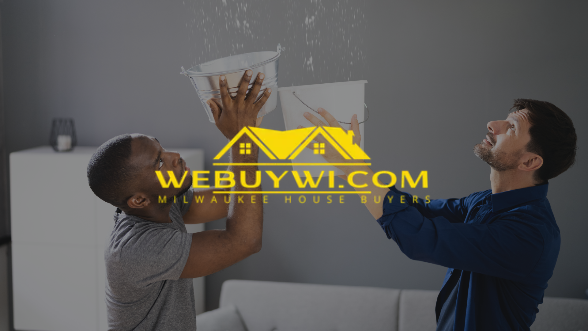 Two men are standing next to each other in a living room symbolizing water damage in waukesha with webuywi.com logo overlaid on top