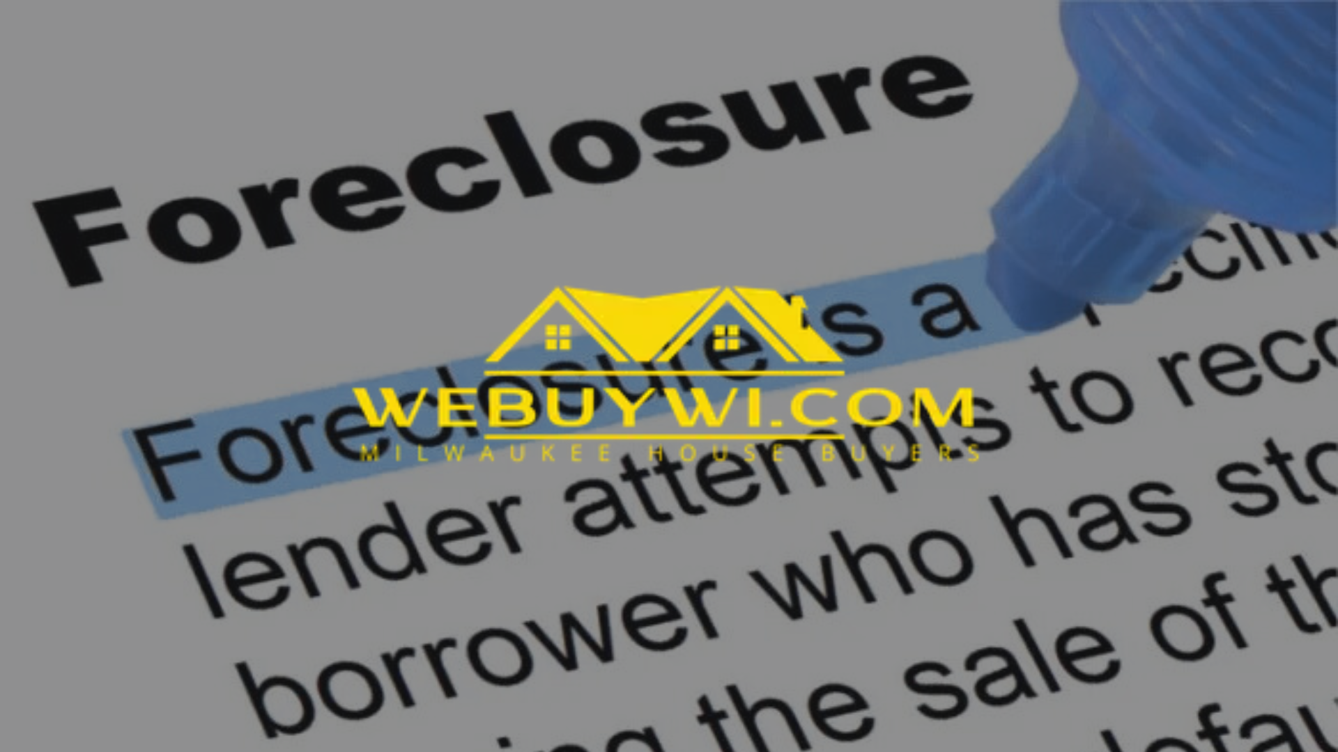 The word foreclosure is highlighted on a piece of paper
