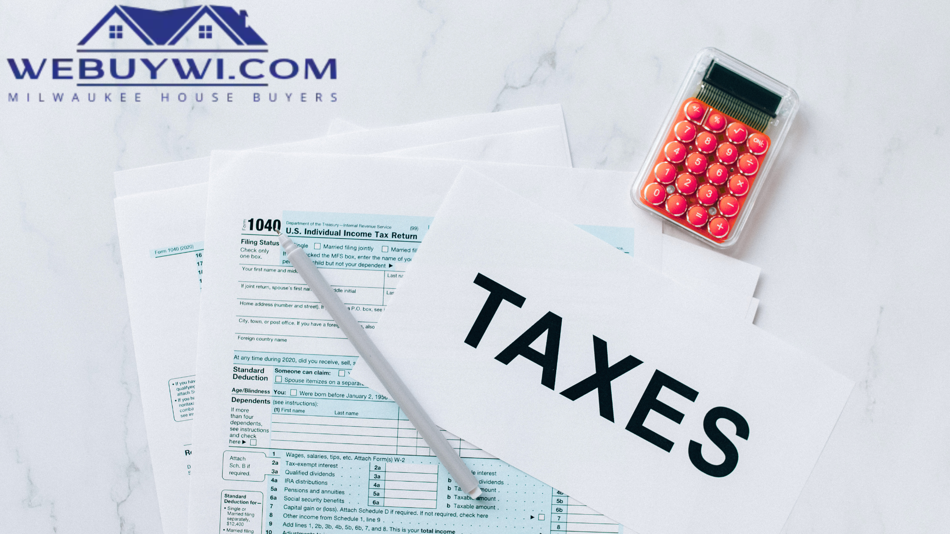 A piece of paper with the word taxes written on it