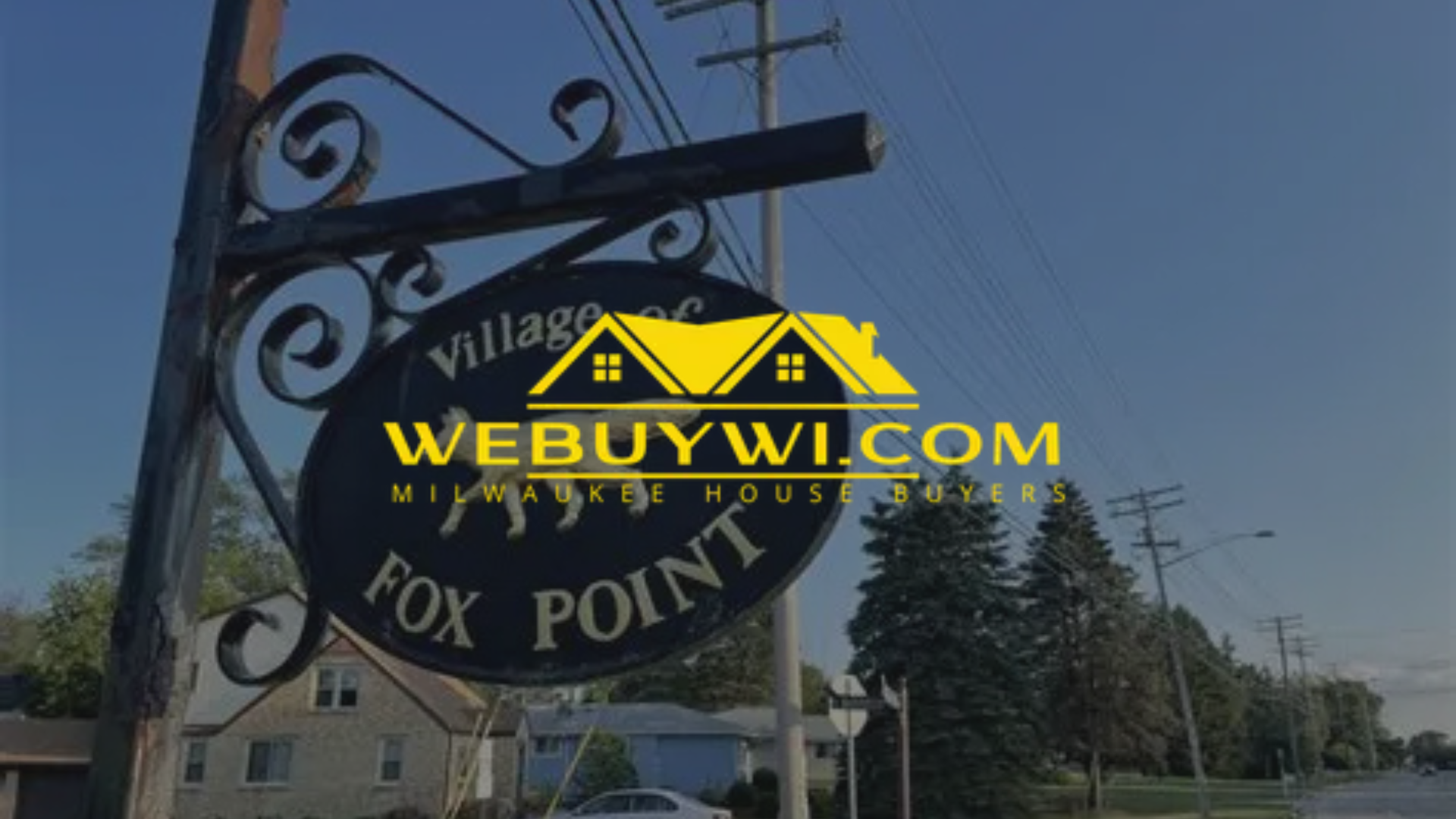 Sign for Village of Fox Point with WEBUYWI.COM logo.