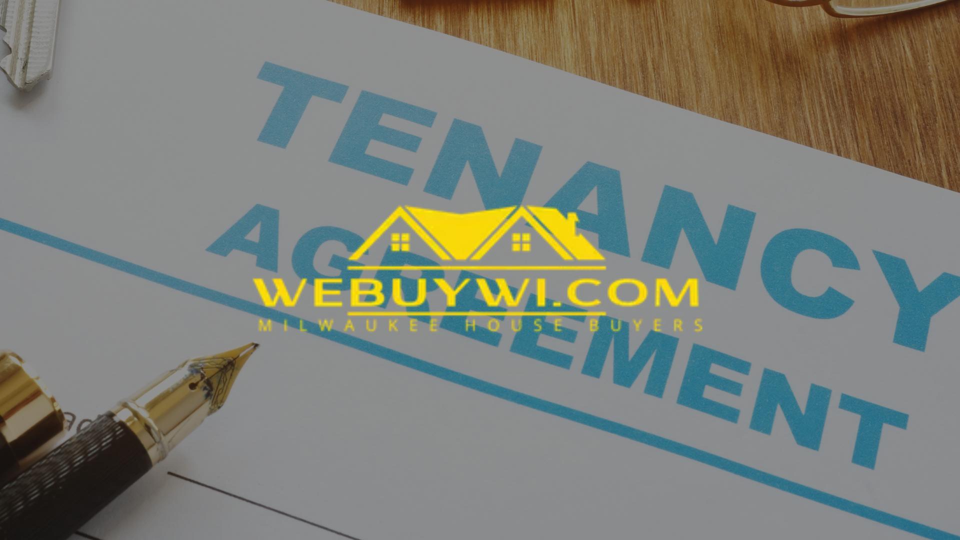 Tenancy agreement document with a pen, keys, and a house logo.