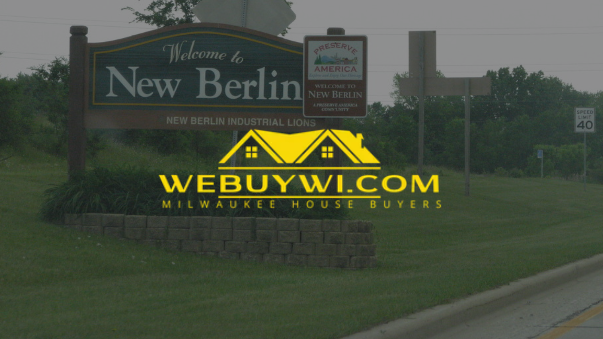 Sign welcoming to New Berlin with a website logo 