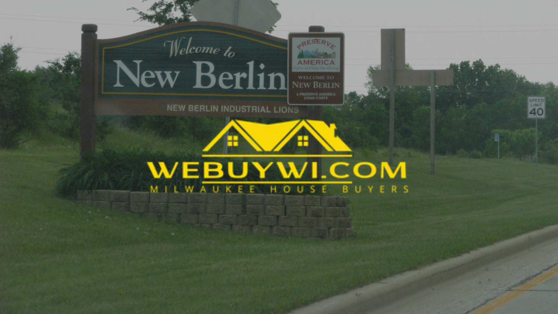 A sign that says welcome to new berlin on it