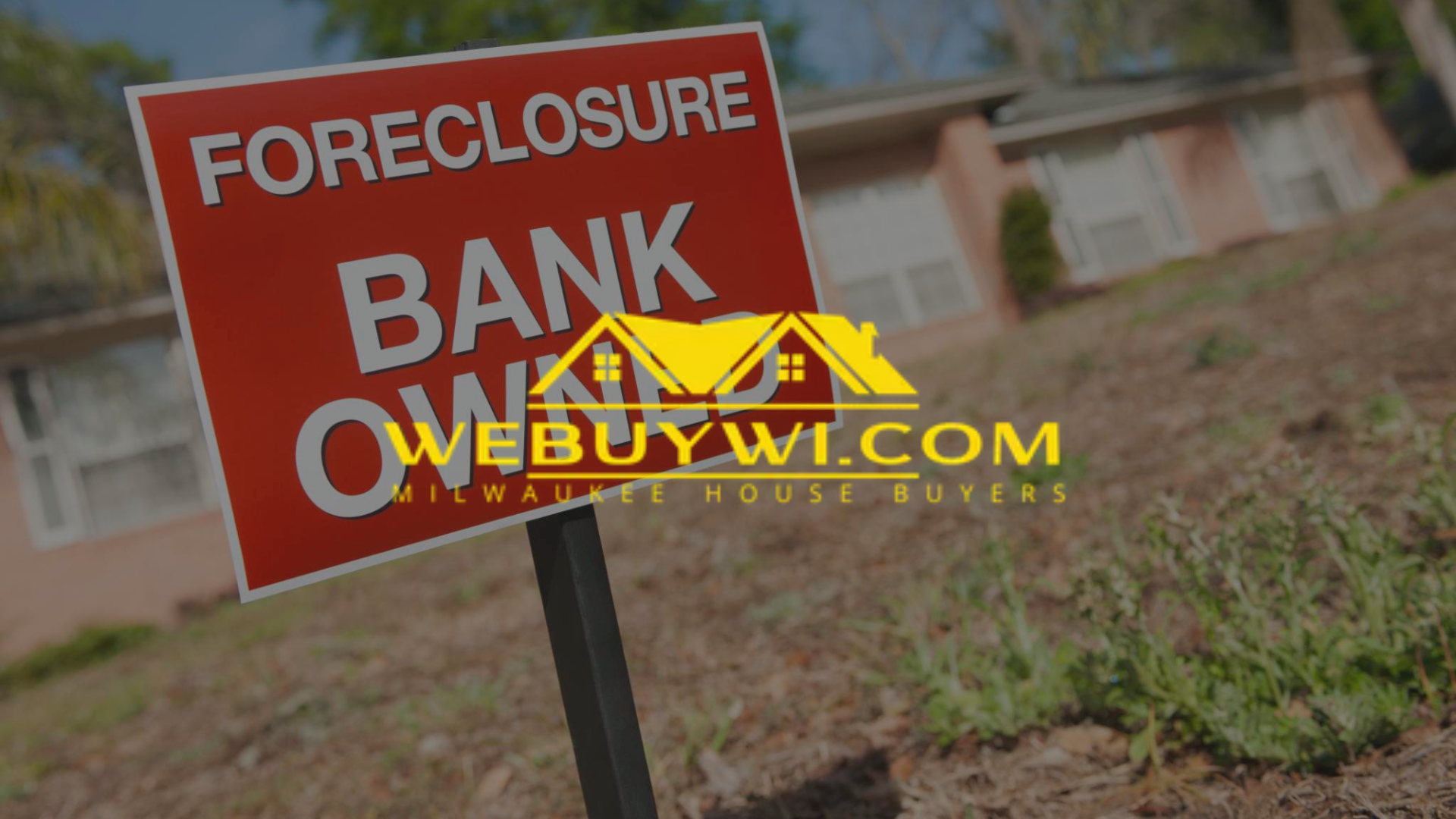 A foreclosure sign is in front of a house.