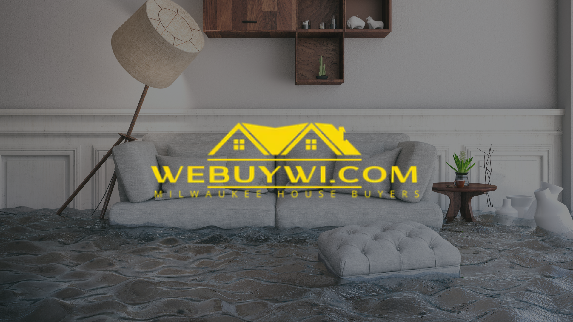 Living room flooded with water; couch, ottoman, lamp, and small table; a 