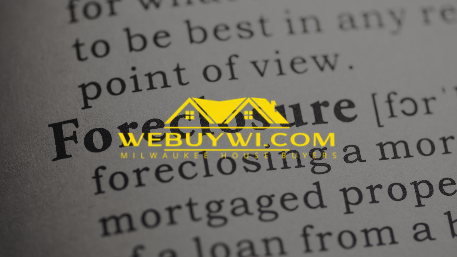 A book is open to a page that says foreclosure