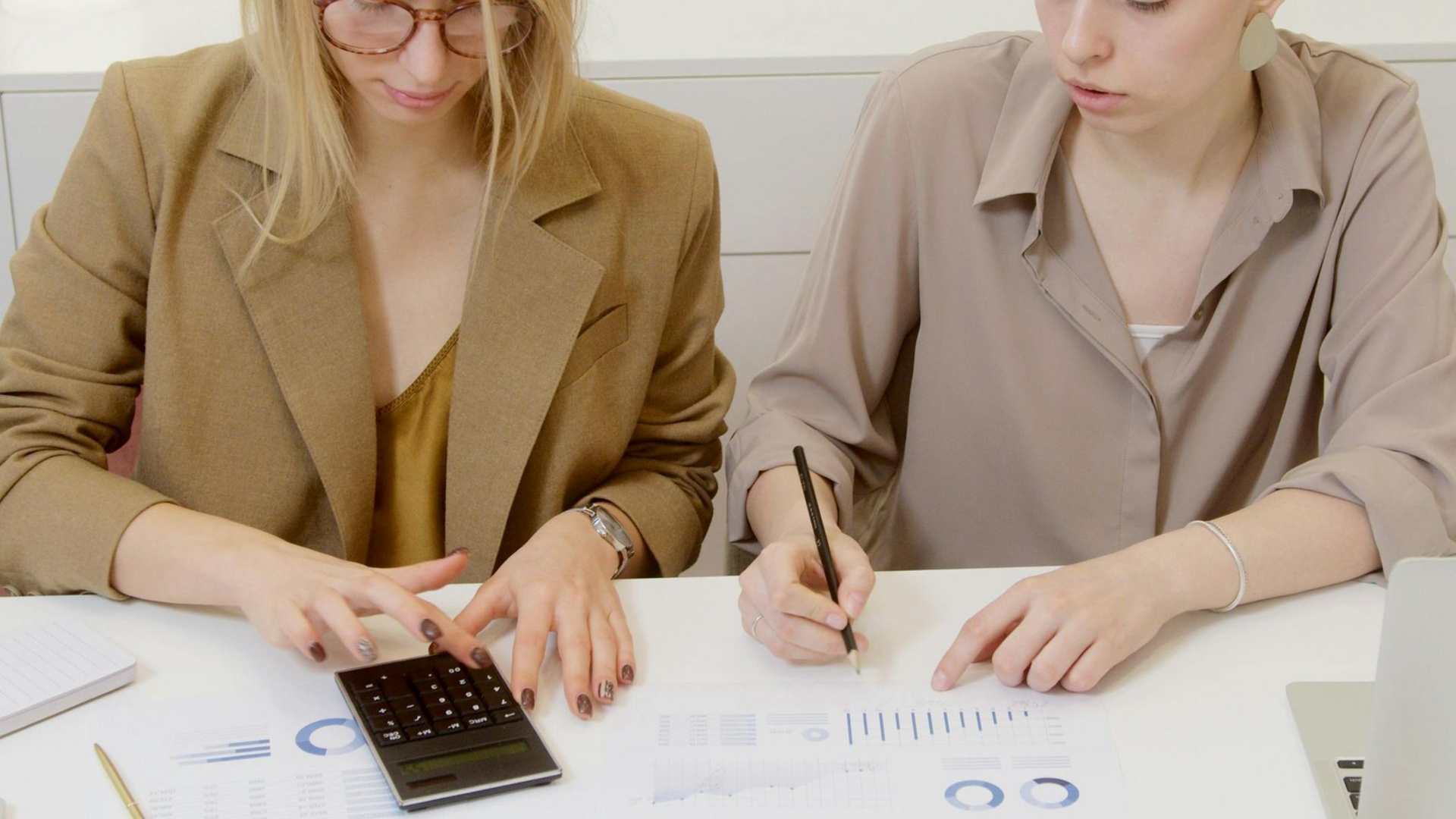 Green typewriter with paper reading