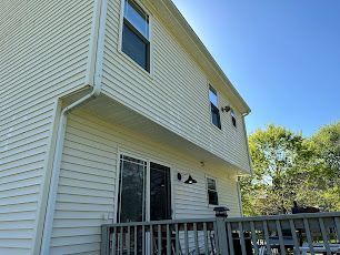 A before photo of a siding cleaning job in Gloucester, VA.