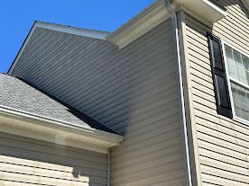 A before photo of a siding cleaning job in Gloucester, VA.