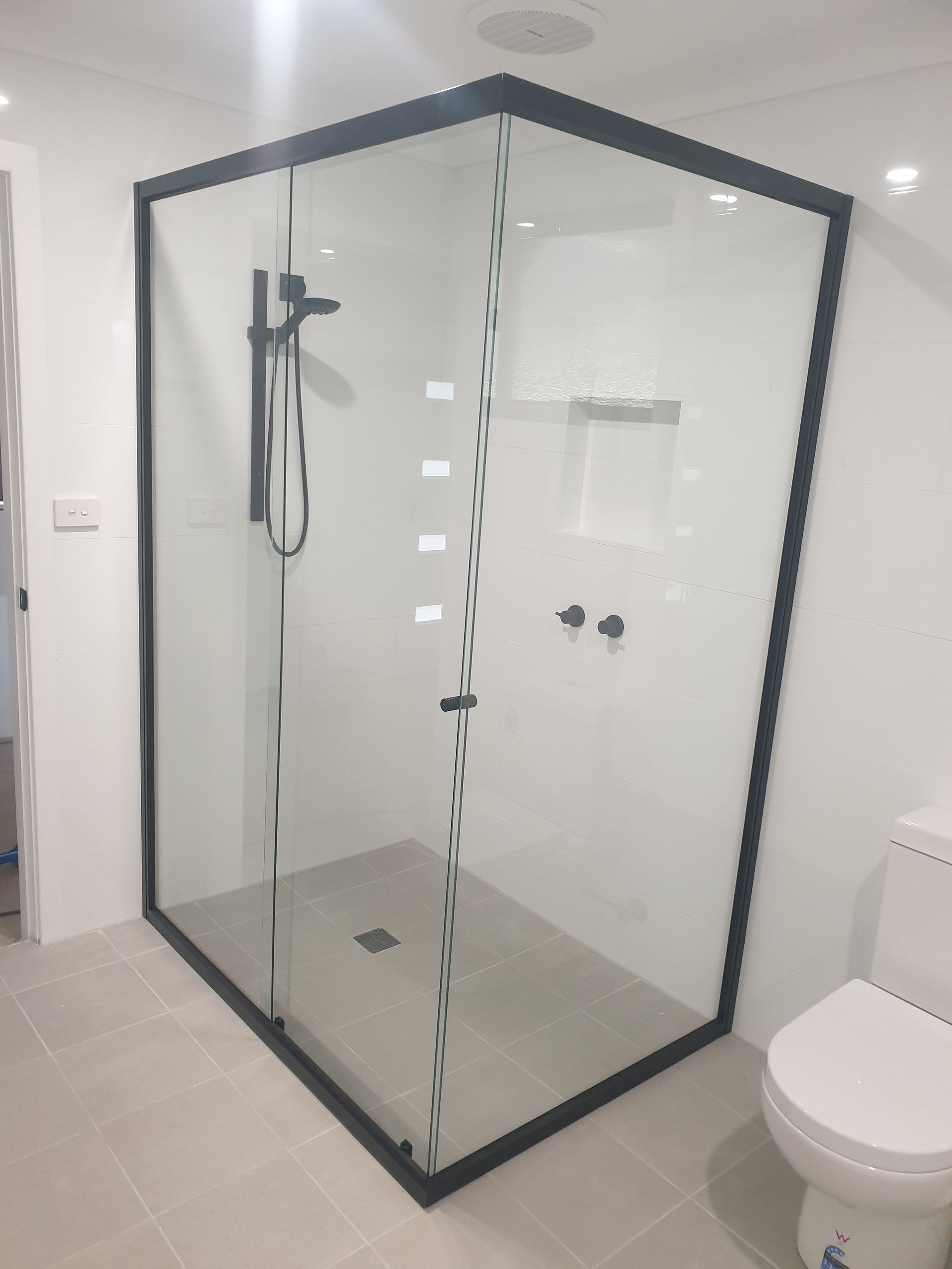Bathroom With Black-framed Glass Shower Enclosure — Local Glassmaster in Huskisson, NSW