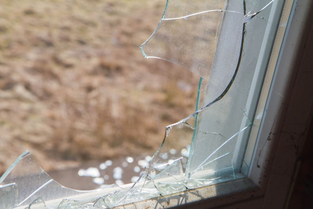 Broken Window Pane With Cracks — Local Glassmaster in Huskisson, NSW