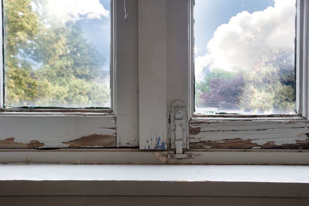White Window Frame With Peeling Paint — Local Glassmaster in Sanctuary Point, NSW