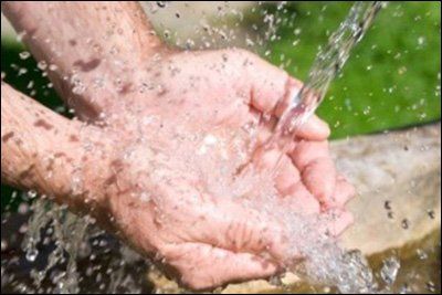 pumping clean water into hands