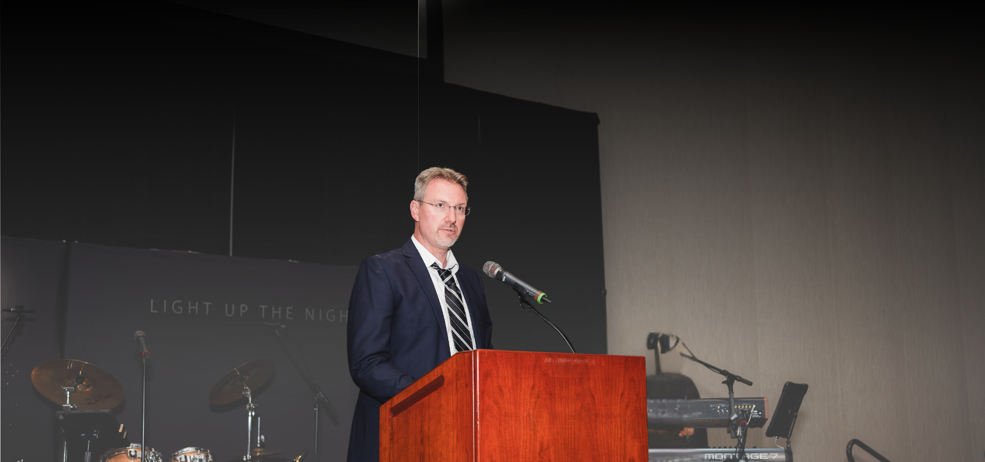 InterCommunity's New President and CEO Tyler Booth onstage at our 2025 gala.