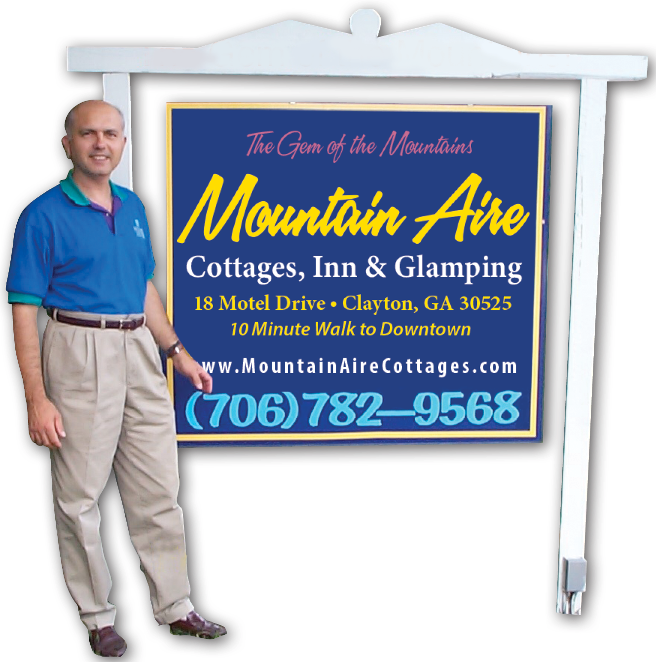 Man Standing Next to a Street Sign Man Standing Next to a Street Sign