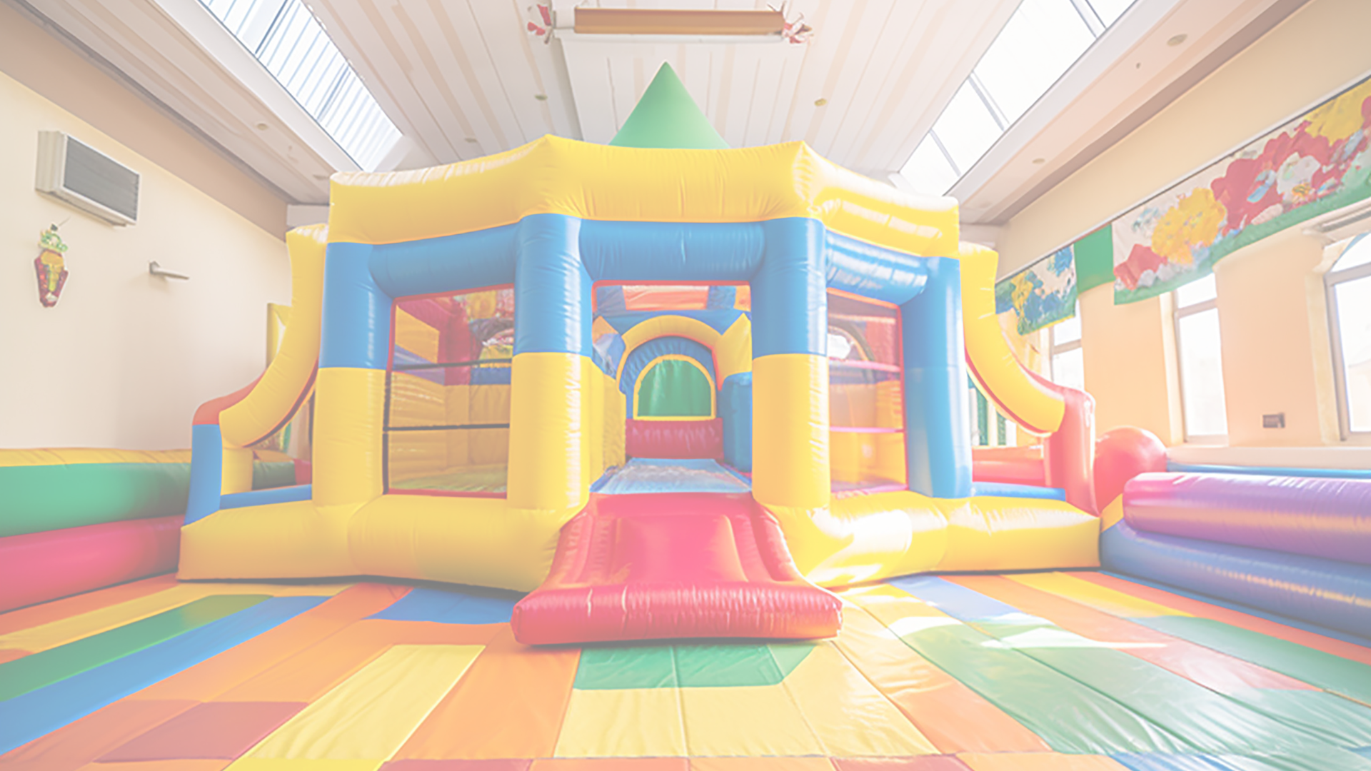 There is a large bouncy house in the middle of the room.