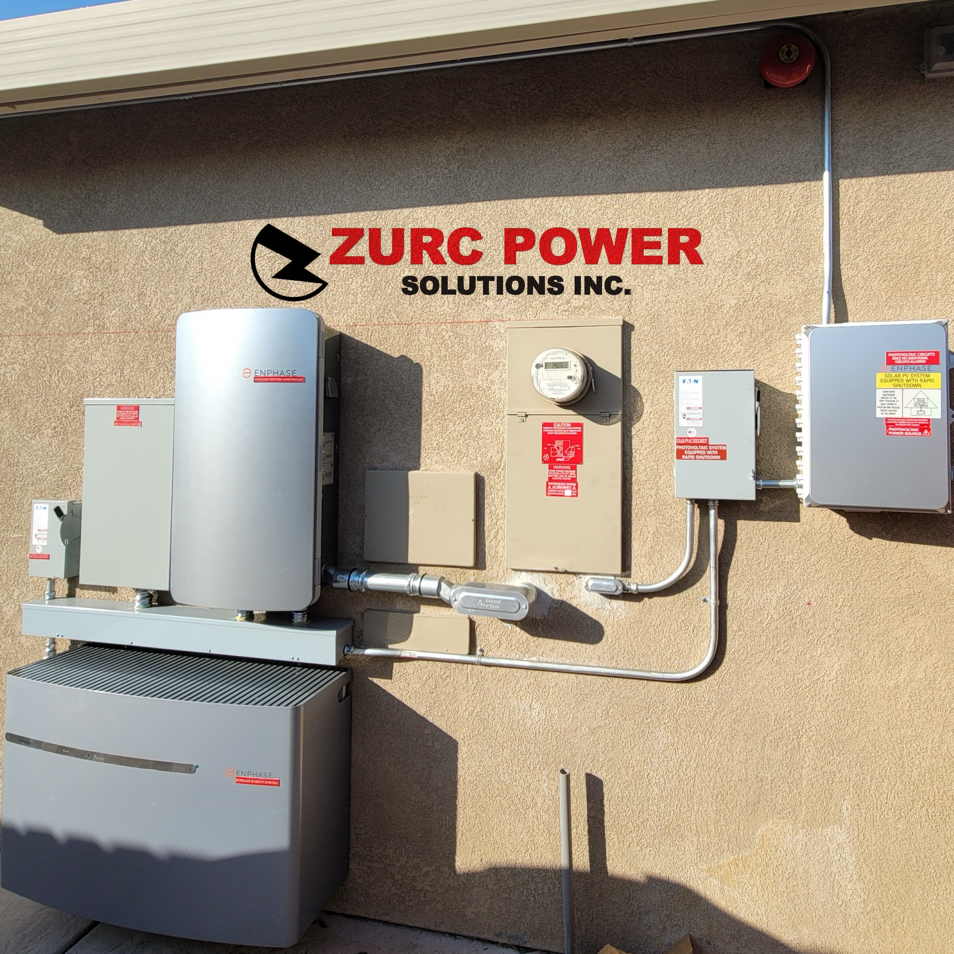 A sign for zurc power solutions inc. is on the side of a building