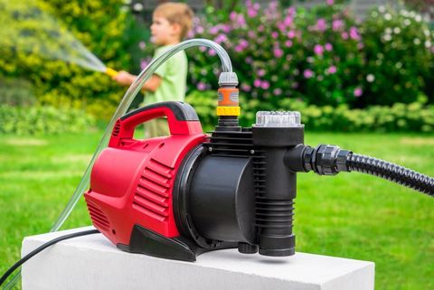 Modern Water Pump In Garden — Pump Supplies in Wellington, NSW