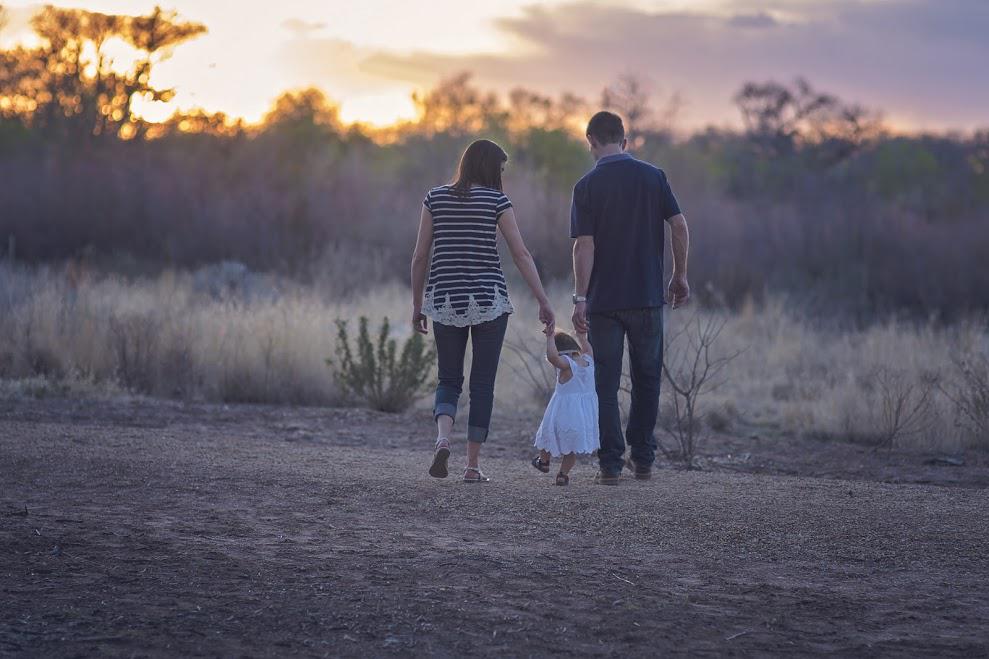 Life Insurance — Family Walking in a Field in Largo, FL