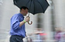 Other Personal Insurance — Man Walking with Umbrella in Largo, FL