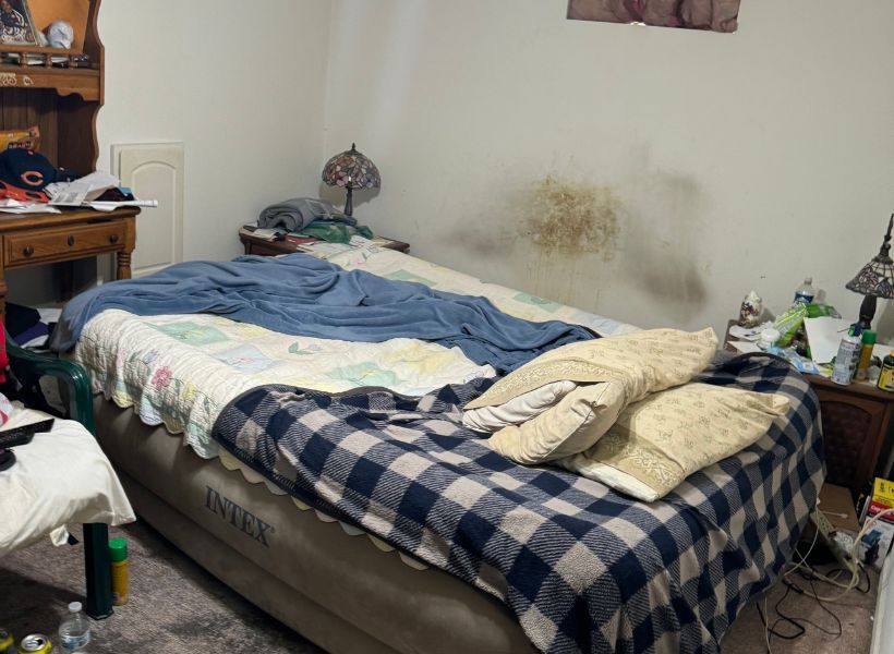 bedroom before water damage restoration