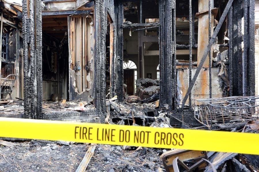 Severe structural fire damage inside a residential home