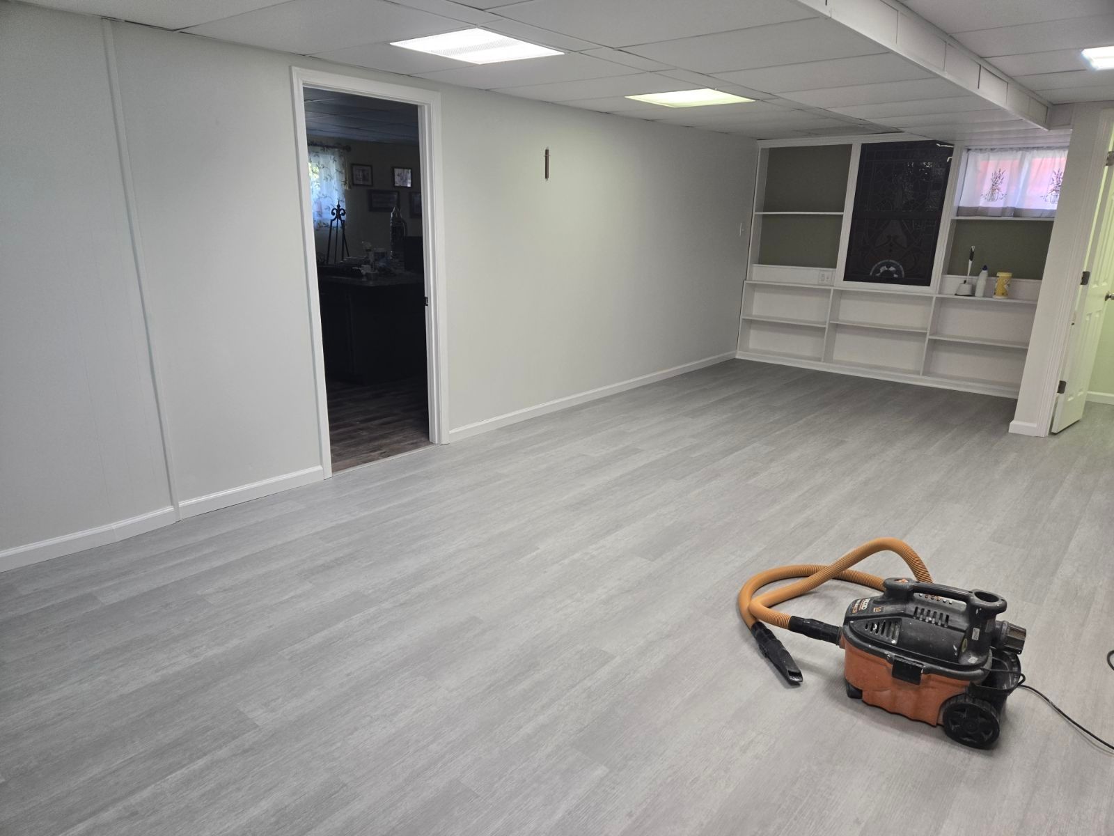 Complete basement restoration with new flooring installed