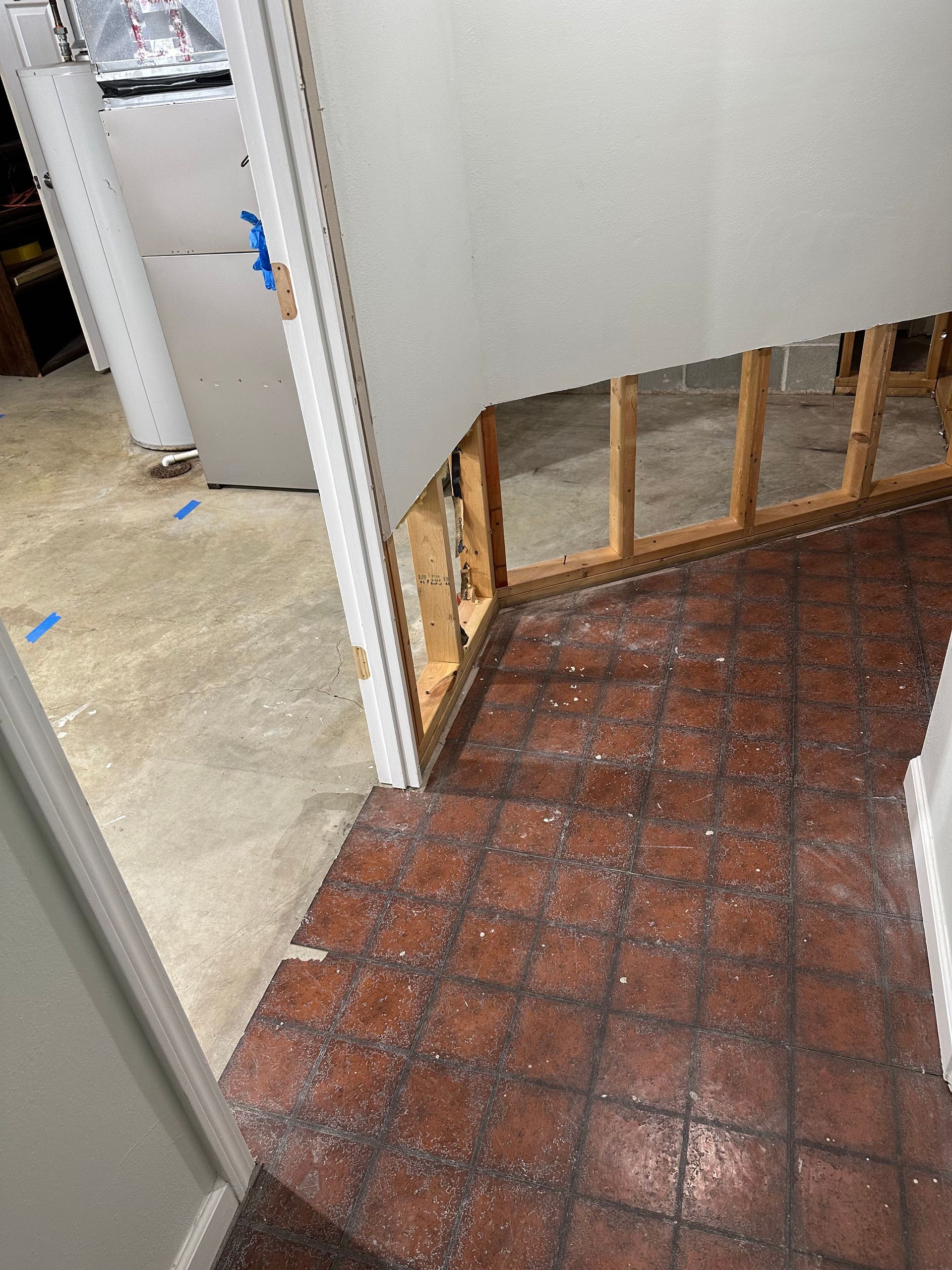 Drywall flood cuts during basement water damage repair