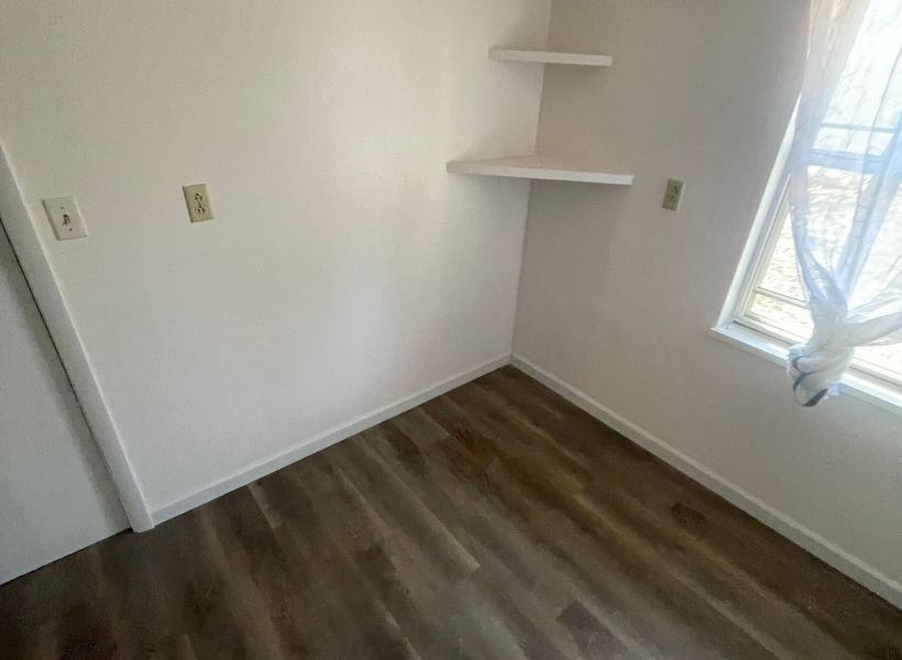 bedroom floor and walls post-restoration