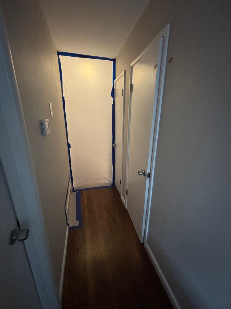 Containment barrier set up in hallway for mold removal