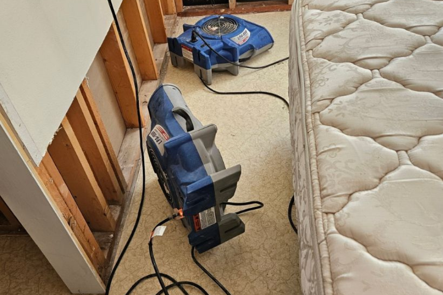 Professional water damage drying equipment in action