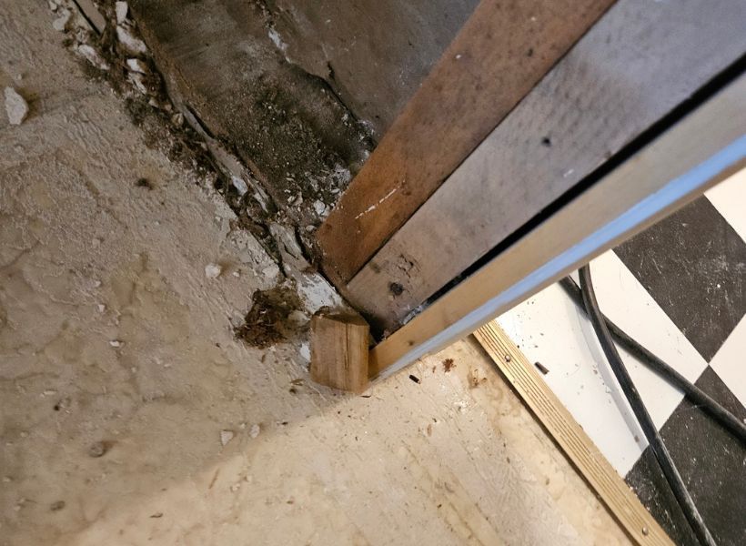 removing drywall and insulation- pulling carpet tiles