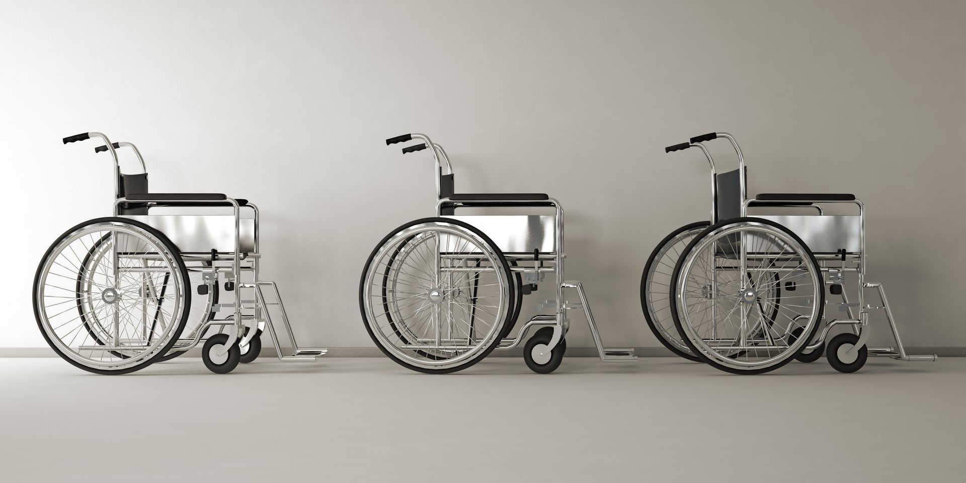 Three wheelchairs lined up, showcasing quality and accessibility of medical equipment.