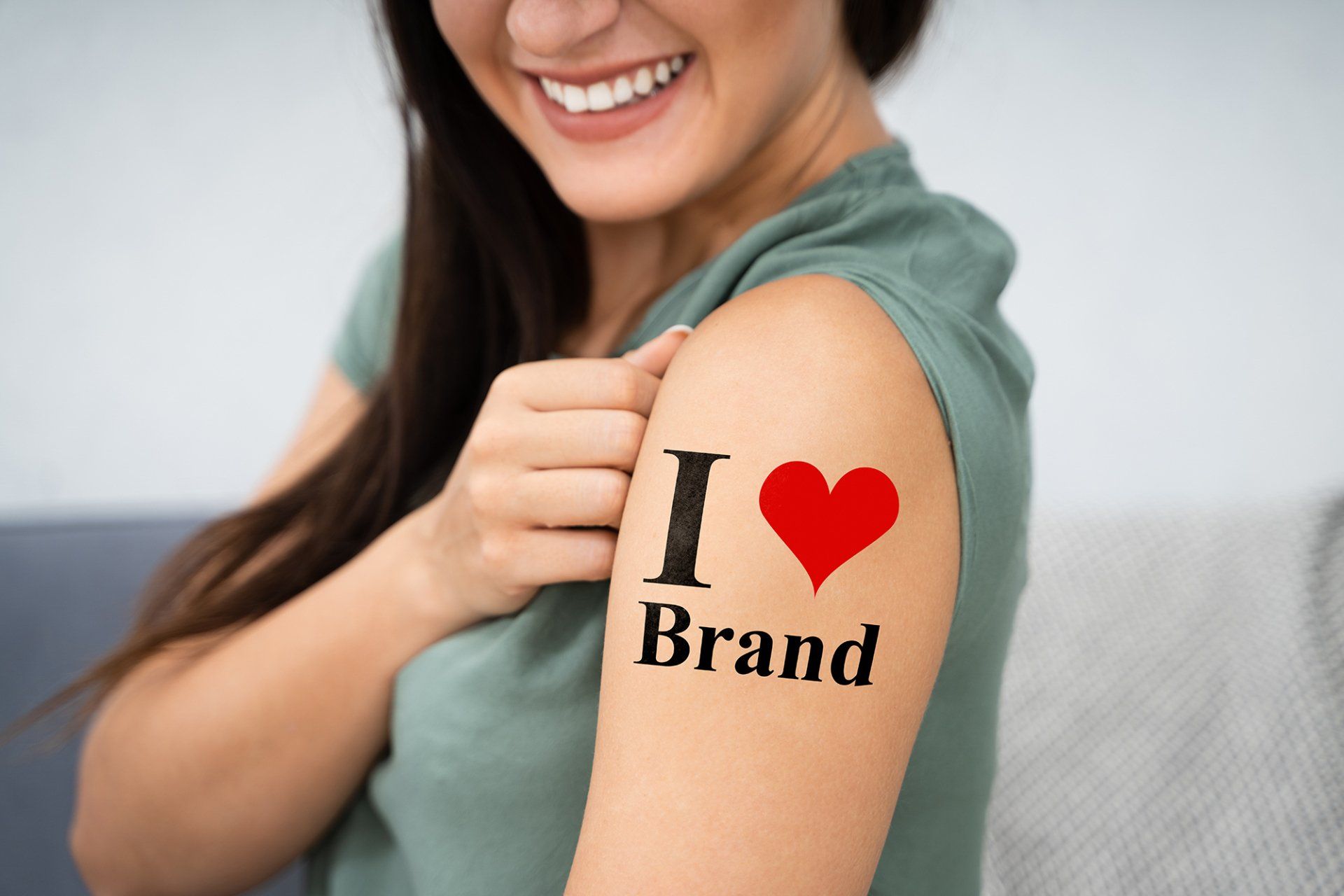 A girl with a Tattoo of  I Love brand