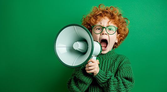 A kid with loudspeaker