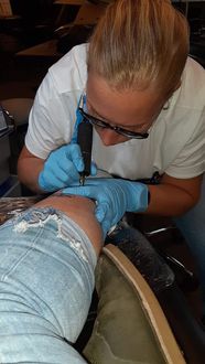 Sharona apprentice tattoo artist