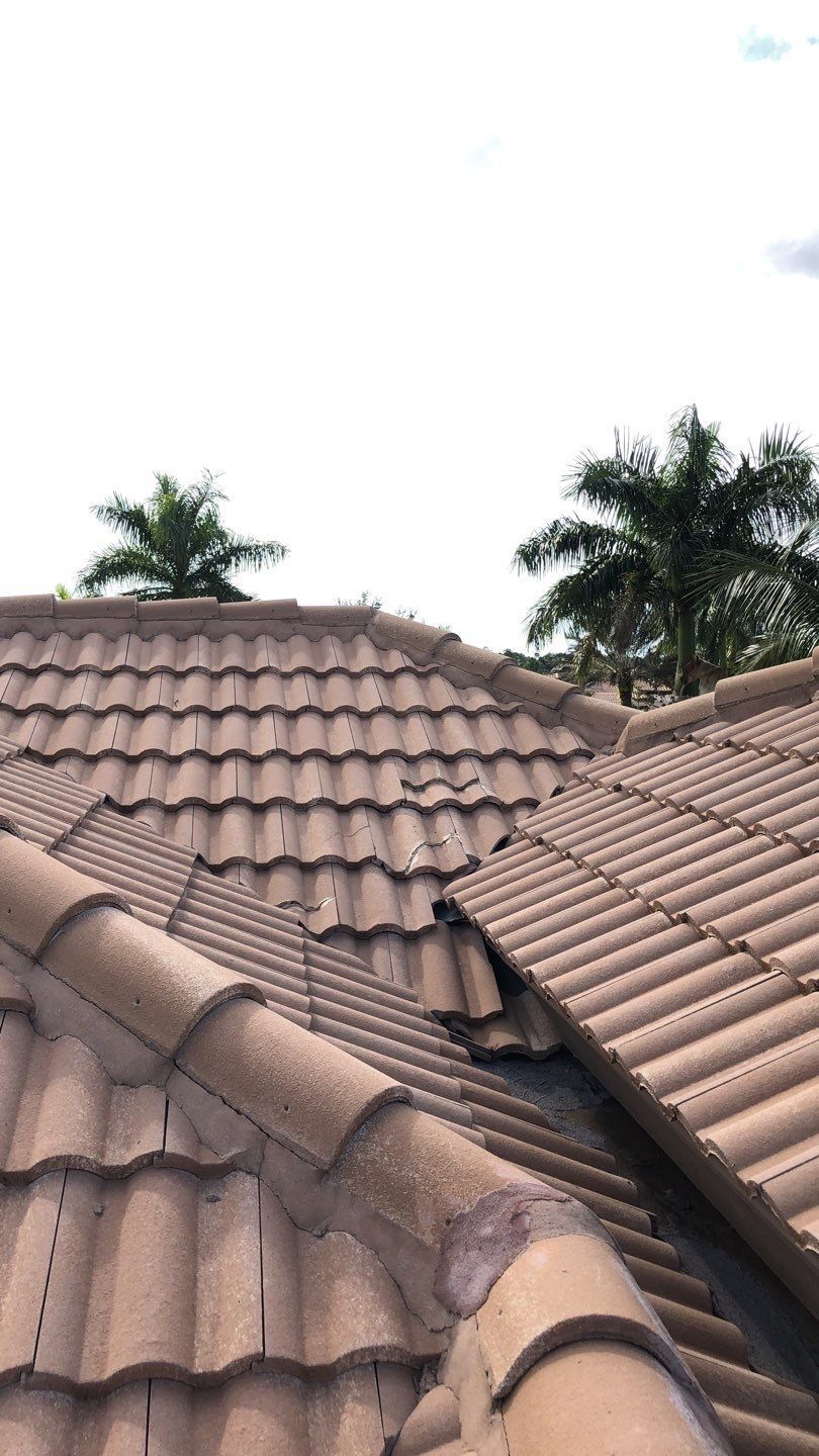 naples roof being inspected