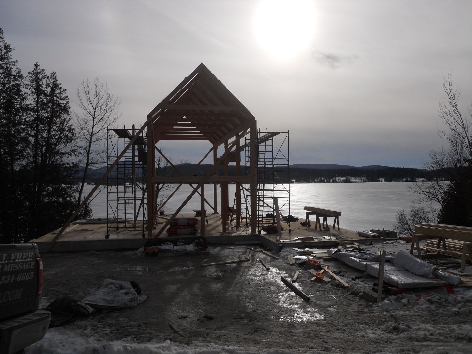 A building is being built next to a body of water