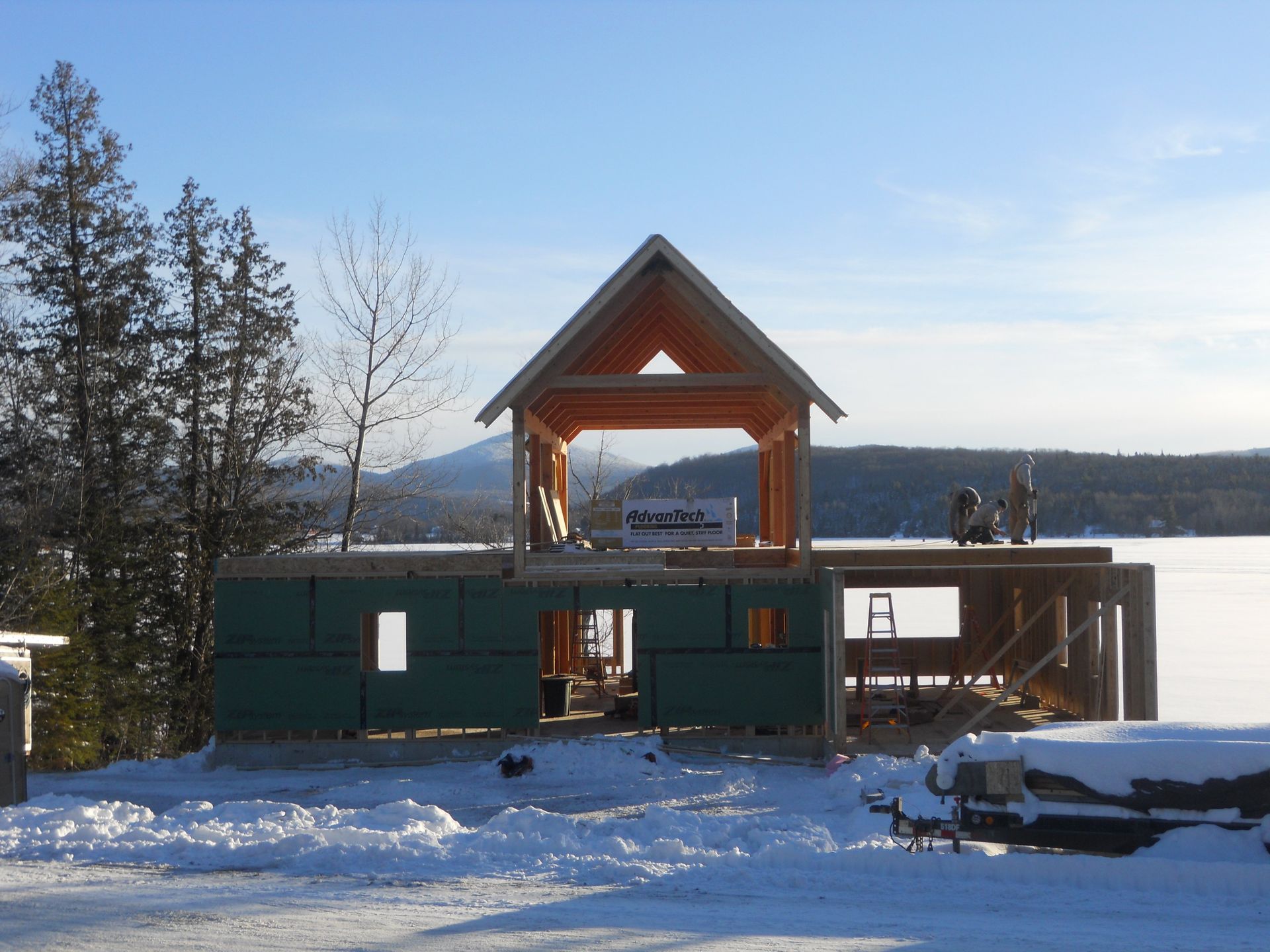 A house that is being built in the snow