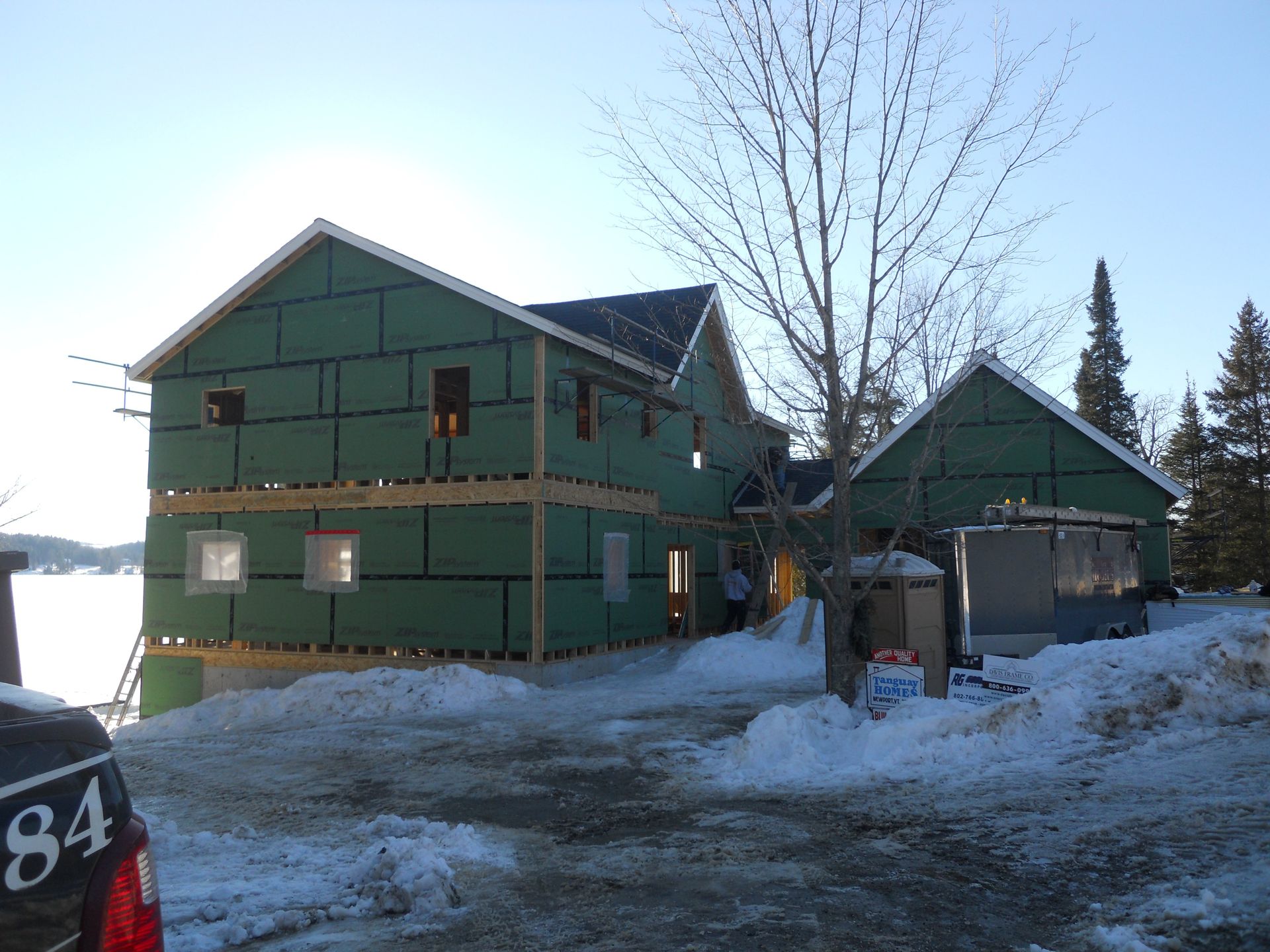 The number 84 is on the back of a truck