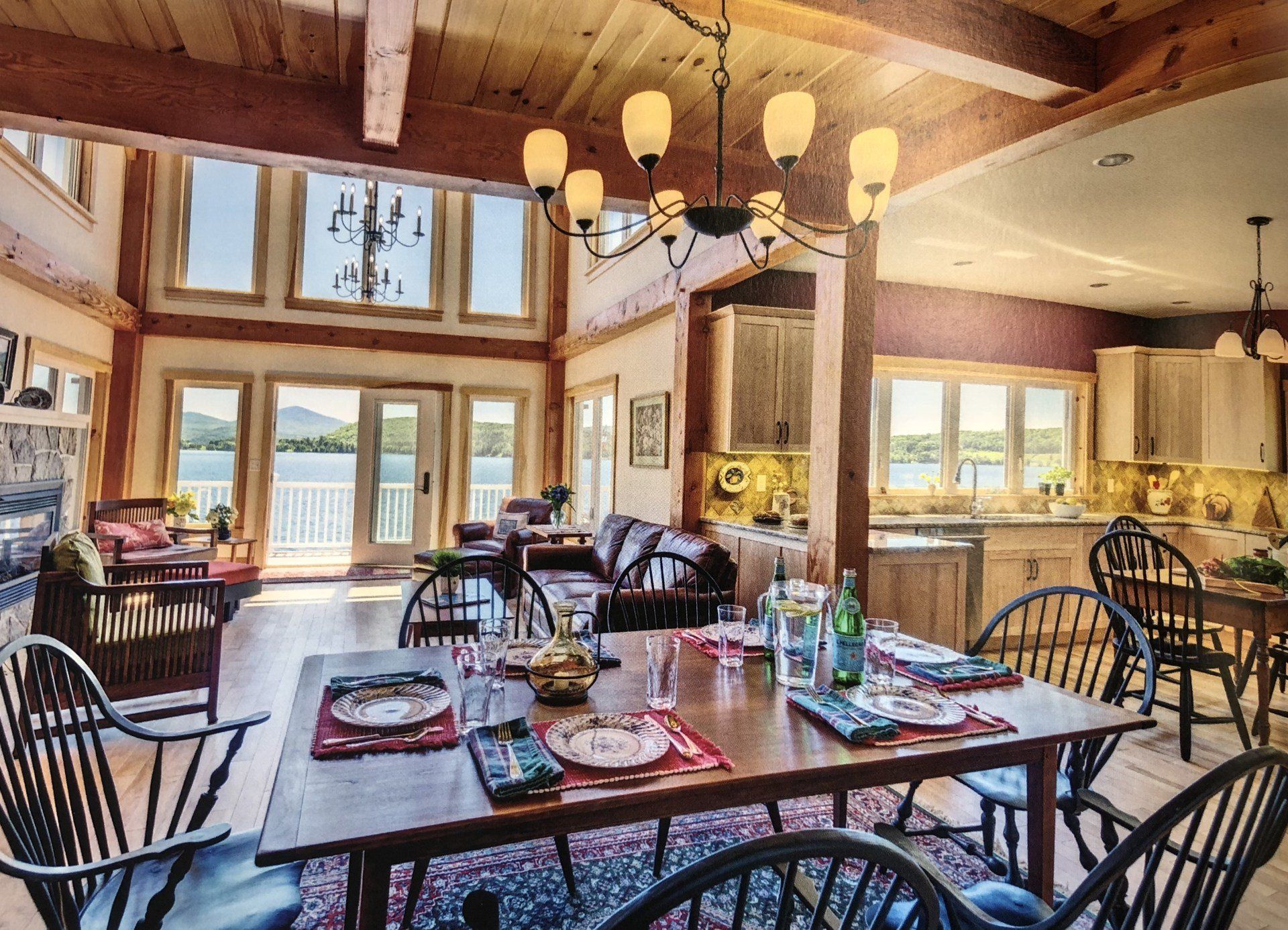 A dining room with a table and chairs and a chandelier