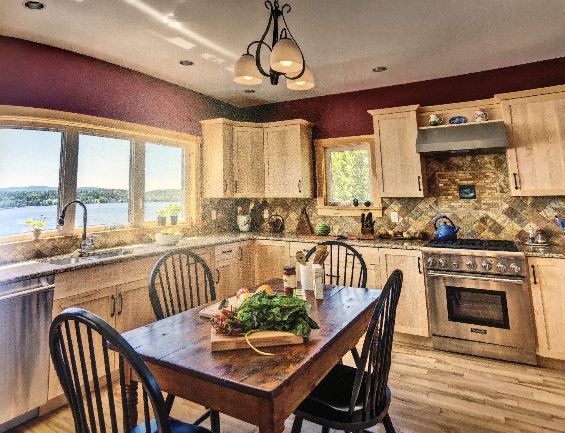 A kitchen with a table and chairs and a stove