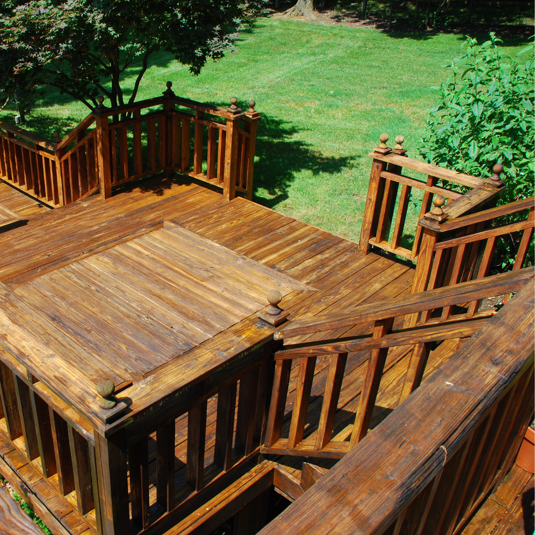 Multi-level dark wooden deck.