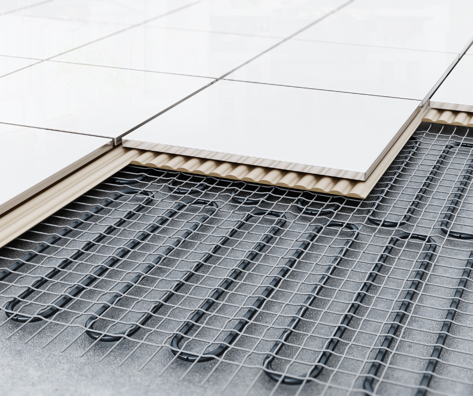 A close up of a heated floor with tiles and wires.