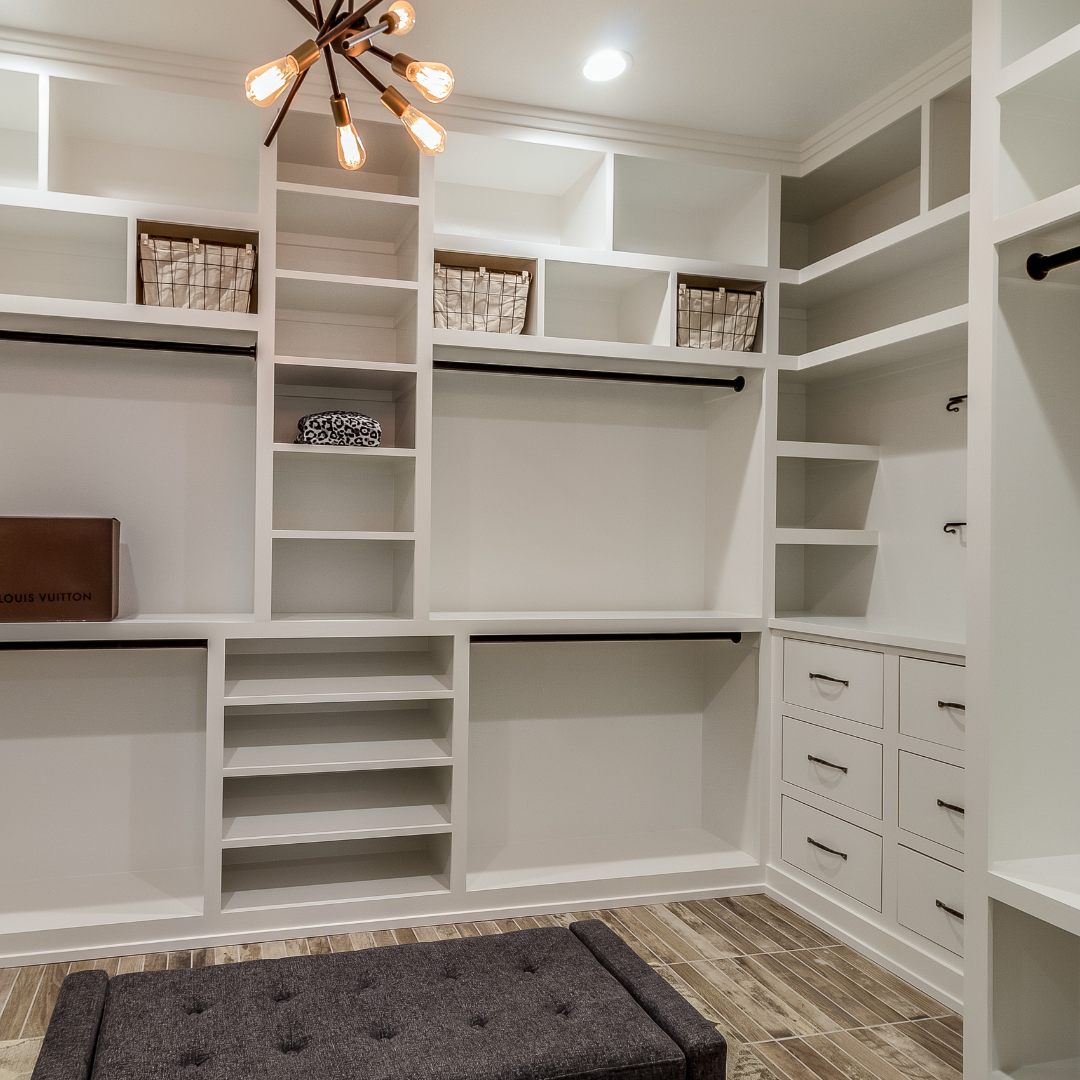 Custom closet with white shelving in a Vermont home