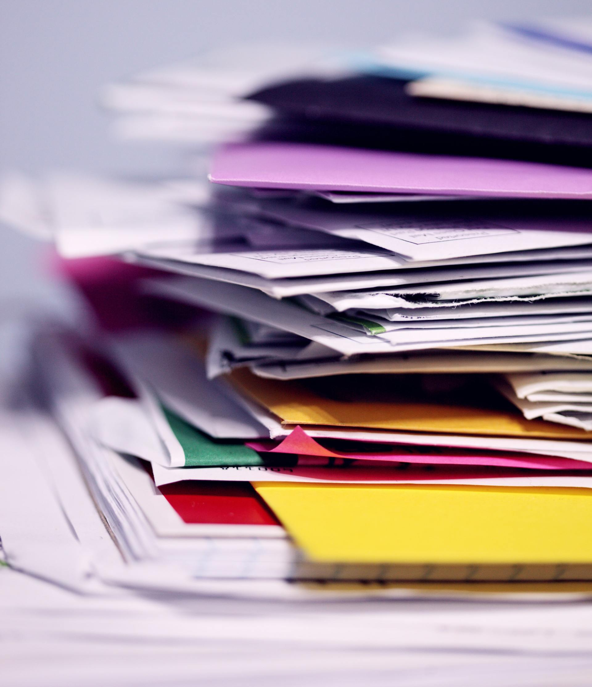 stack of different papers and documents