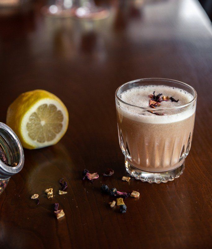 handcrafted cocktail on bar at planter's house st. louis